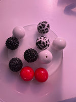 Black red and white cow